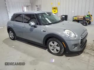 ✅ 2015 MINI Hardtop 4 Door • VIN: WMWXS5C50FT828681 • Lot: 91248905. Wystawiony na Copart z przebiegiem 115 326 mil. Bezpłatny archiwum sprzedaży aukcyjnych z USA i szczegółowy raport historii pojazdu na DreamBid. Zdjęcie 4.