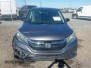 ✅ 2016 Honda CR-V LX • VIN: 3CZRM3H39GG704869 • Lot: 43588432. Listed on IAAI with 105,234 mi. Free auction sales archive from the USA and detailed vehicle history report at DreamBid. Image 12.