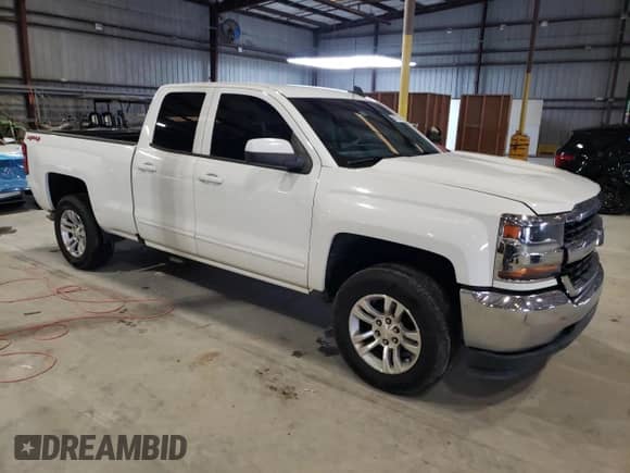 2019 Chevrolet Silverado 1500 LT with VIN 2GCVKPEC8K1165328, listed as a Copart auction lot 86112365 with 114,400 mi miles and Salvage title. Bid and sale history available at DreamBid. Image 4.