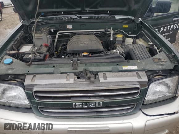 ✅ 2002 Isuzu Trooper S • VIN: JACDJ58X127J10500 • Lot: 85403245. Listed on Copart with 216,762 mi. Free auction sales archive from the USA and detailed vehicle history report at DreamBid. Image 12.