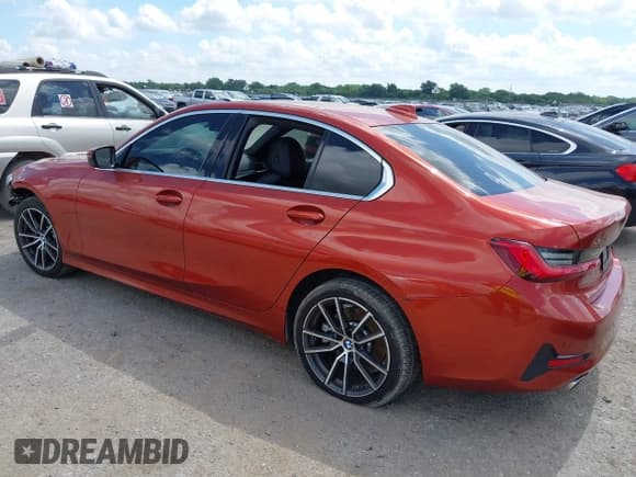 ✅ 2021 BMW 3 Series 330i xDrive • VIN: 3MW5R7J01M8B77667 • Lot: 42569602. Listed on IAAI with 61,457 mi. Free auction sales archive from the USA and detailed vehicle history report at DreamBid. Image 3.