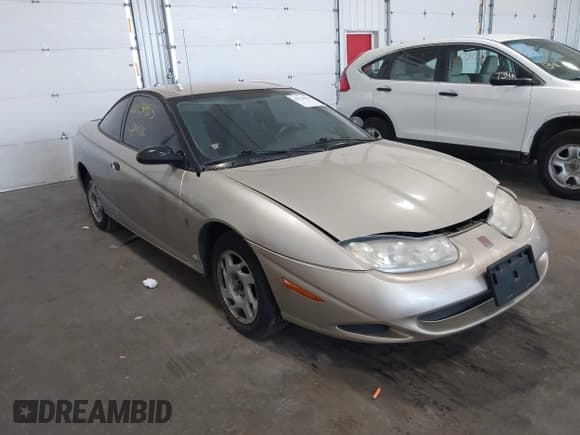 ✅ 2001 Saturn SC • VIN: 1G8ZP12841Z300417 • Лот: 42731965. Опубликован ранее на IAAI с пробегом 151 041 миль. Бесплатный доступ к архиву аукционных продаж из США и подробный отчёт об истории автомобиля на DreamBid. Изображение 6.