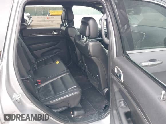 2018 Jeep Grand Cherokee Sterling z VIN 1C4RJFBG3JC138410, wystawiony jako IAAI lot #43242404 z przebiegiem 119 655 mil mil oraz . Historia ofert i sprzedaży dostępna na DreamBid. Obrazek 8.