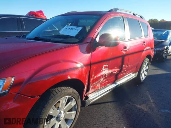 2012 Mitsubishi Outlander SE z VIN JA4JT3AW5CU002950, wystawiony jako IAAI lot #43528744 z przebiegiem 111 659 mil mil oraz . Historia ofert i sprzedaży dostępna na DreamBid. Obrazek 18.