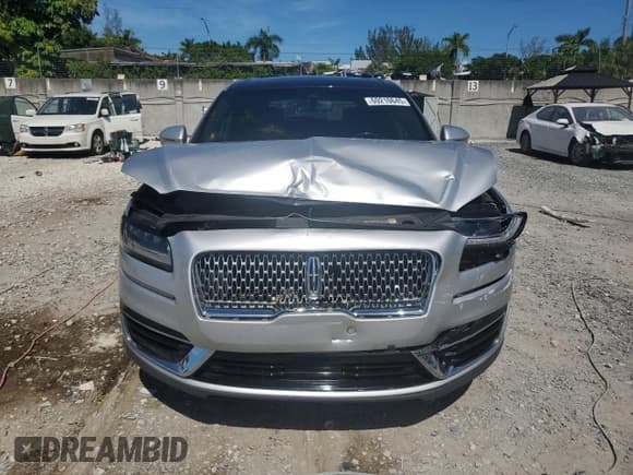 ✅ 2019 Lincoln Nautilus Reserve • VIN: 2LMPJ6LP1KBL50990 • Lot: 69210645. Listed on Copart with 65,309 mi. Free auction sales archive from the USA and detailed vehicle history report at DreamBid. Image 5.
