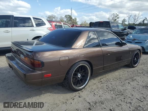 ✅ 1991 Nissan 240SX • VIN: JN1MS34PXMW001053 • Lot: 79007744. Listed on Copart with 172,425 mi. Free auction sales archive from the USA and detailed vehicle history report at DreamBid. Image 3.
