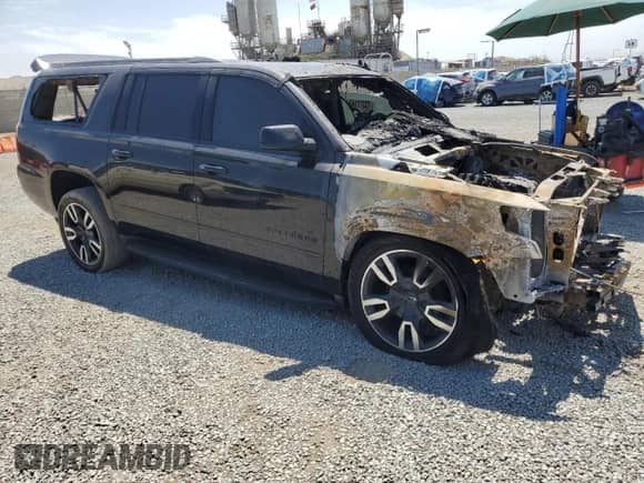 2020 Chevrolet Suburban Premier с VIN 1GNSCJKC4LR274399, выставлен на аукционе Copart как лот 70371165 с пробегом Не указан миль и На запчасти • Non repairable. История ставок и продаж доступна на DreamBid. Изображение 4.