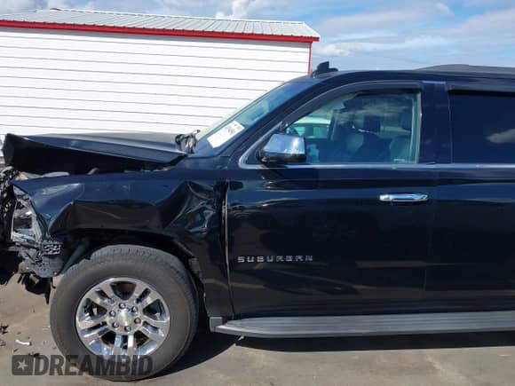 2018 Chevrolet Suburban LT z VIN 1GNSKHKC3JR146681, wystawiony jako IAAI lot #43394501 z przebiegiem 206 697 mil mil oraz . Historia ofert i sprzedaży dostępna na DreamBid. Obrazek 17.