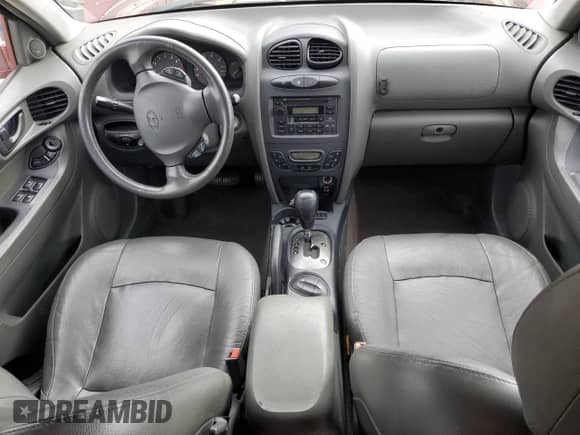 2002 Hyundai Santa Fe GLS z VIN KM8SC13D02U173092, wystawiony jako Copart lot #87683115 z przebiegiem 96 950 mil mil oraz Szkoda całkowita • Salvage title. Historia ofert i sprzedaży dostępna na DreamBid. Obrazek 8.