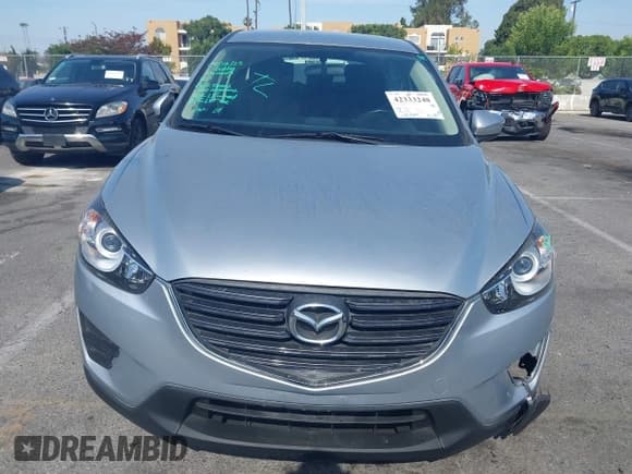 ✅ 2016 Mazda CX-5 Sport • VIN: JM3KE2BY4G0845816 • Lot: 42333248. Listed on IAAI with 48,504 mi. Free auction sales archive from the USA and detailed vehicle history report at DreamBid. Image 12.