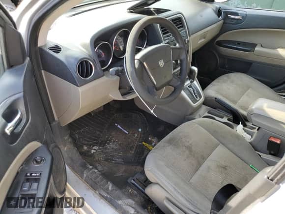 2010 Dodge Caliber SXT с VIN 1B3CB4HA6AD632590, выставлен на аукционе Copart как лот 75929634 с пробегом 213 273 миль миль и Списание • Salvage title. История ставок и продаж доступна на DreamBid. Изображение 8.