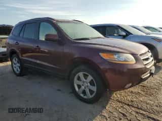 2009 Hyundai Santa Fe Limited z VIN 5NMSH13E79H270144, wystawiony jako Copart lot #74977124 z przebiegiem Nie podano mil oraz Szkoda całkowita • Salvage title. Historia ofert i sprzedaży dostępna na DreamBid. Obrazek 4.