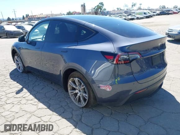 ✅ 2023 Tesla Model Y Long Range • VIN: 7SAYGDEE8PA122529 • Lot: 43101493. Listed on IAAI with 29,770 mi. Free auction sales archive from the USA and detailed vehicle history report at DreamBid. Image 3.