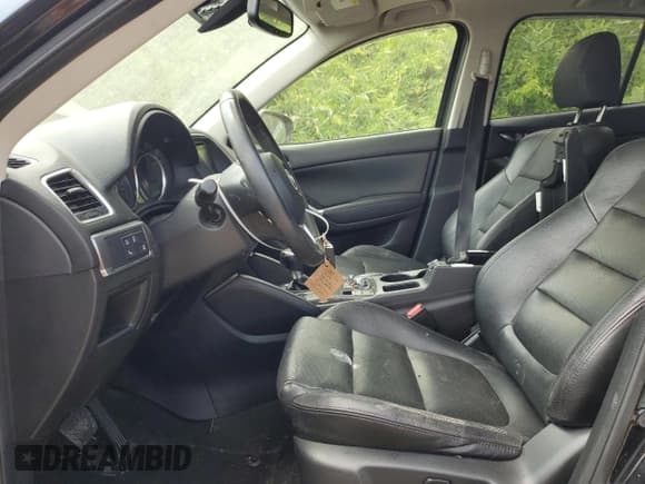 ✅ 2016 Mazda CX-5 Grand Touring • VIN: JM3KE4DYXG0613200 • Lot: 67213445. Listed on Copart with 105,864 mi. Free auction sales archive from the USA and detailed vehicle history report at DreamBid. Image 7.