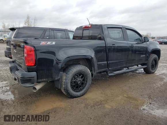 ✅ 2018 Chevrolet Colorado 4WD Z71 • VIN: 1GCPTDE11J1325959 • Лот: 92375575. Опубликован ранее на Copart с пробегом 121 511 миль. Бесплатный доступ к архиву аукционных продаж из США и подробный отчёт об истории автомобиля на DreamBid. Изображение 3.