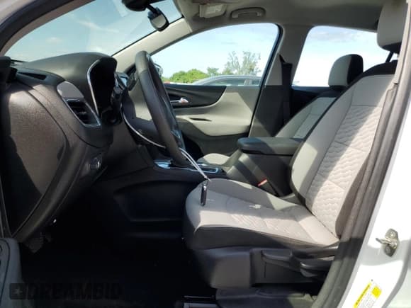 ✅ 2020 Chevrolet Equinox LS • VIN: 3GNAXHEV9LS703359 • Lot: 84446825. Wystawiony na Copart z przebiegiem 70 512 mil. Bezpłatny archiwum sprzedaży aukcyjnych z USA i szczegółowy raport historii pojazdu na DreamBid. Zdjęcie 7.