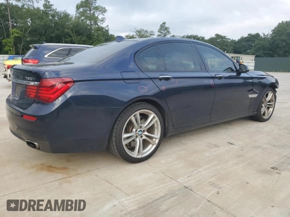 ✅ 2015 BMW 7 Series 750i • VIN: WBAYA8C51FG197764 • Lot: 67095554. Listed on Copart with 167,458 mi. Free auction sales archive from the USA and detailed vehicle history report at DreamBid. Image 3.