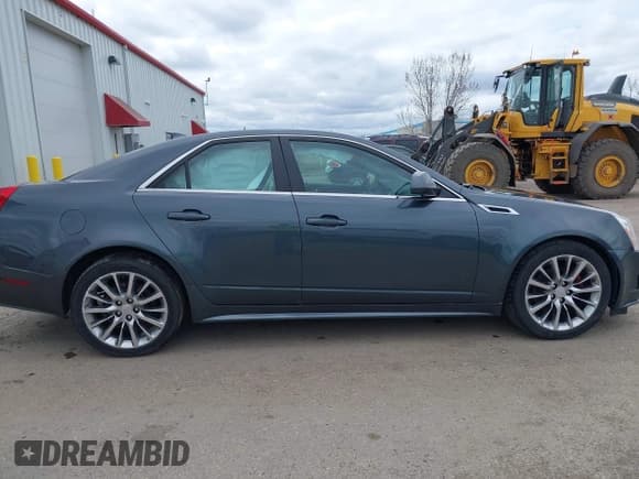 ✅ 2012 Cadillac CTS Luxury • VIN: 1G6DG5E51C0122078 • Lot: 42086692. Listed on IAAI with 125,231 mi. Free auction sales archive from the USA and detailed vehicle history report at DreamBid. Image 14.
