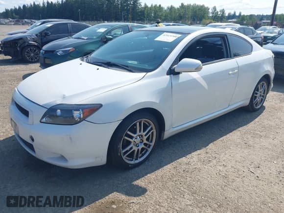 ✅ 2007 Scion tC Spec • VIN: JTKDE177570203724 • Lot: 42415264. Listed on IAAI with 210,185 mi. Free auction sales archive from the USA and detailed vehicle history report at DreamBid. Image 2.