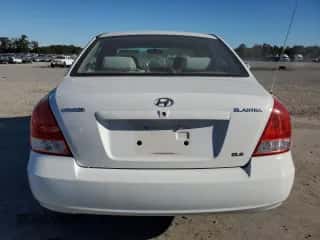 2003 Hyundai Elantra GLS z VIN KMHDN45D13U521386, wystawiony jako Copart lot #75726144 z przebiegiem 169 663 mil mil oraz Szkoda całkowita • Salvage title. Historia ofert i sprzedaży dostępna na DreamBid. Obrazek 6.