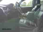 2020 Chevrolet Tahoe Premier with VIN 1GNSKCKC1LR216510, listed as a Copart auction lot 57627705 with 113,495 mi miles and Salvage title. Bid and sale history available at DreamBid. Image 7.