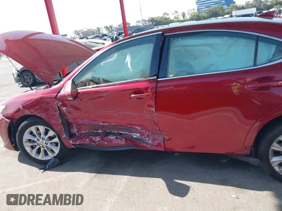 ✅ 2015 Lexus ES 300h • VIN: JTHBW1GG9F2099767 • Lot: 42867492. Listed on IAAI with 109,480 mi. Free auction sales archive from the USA and detailed vehicle history report at DreamBid. Image 6.