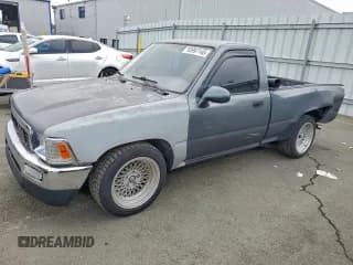 ✅ 1990 Toyota Pickup • VIN: JT4RN81A7L5049301 • Lot: 93997145. Listed on Copart with 217,096 mi. Free auction sales archive from the USA and detailed vehicle history report at DreamBid. Image 1.