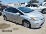 ✅ 2014 Toyota Prius • VIN: JTDKN3DP1E3052567 • Lot: 42872309. Listed on IAAI with 209,125 mi. Free auction sales archive from the USA and detailed vehicle history report at DreamBid. Image 1.