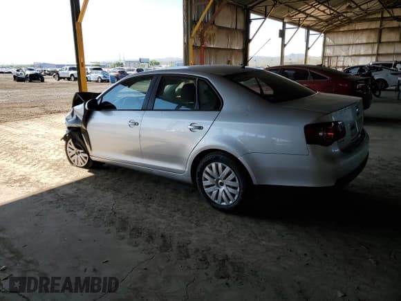 ✅ 2010 Volkswagen Jetta S • VIN: 3VWJZ7AJ9AM095602 • Lot: 59711045. Listed on Copart with 217,247 mi. Free auction sales archive from the USA and detailed vehicle history report at DreamBid. Image 2.
