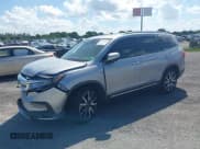 ✅ 2021 Honda Pilot Touring 8-Passenger • VIN: 5FNYF5H99MB041638 • Lot: 42112915. Listed on IAAI with 33,230 mi. Free auction sales archive from the USA and detailed vehicle history report at DreamBid. Image 2.