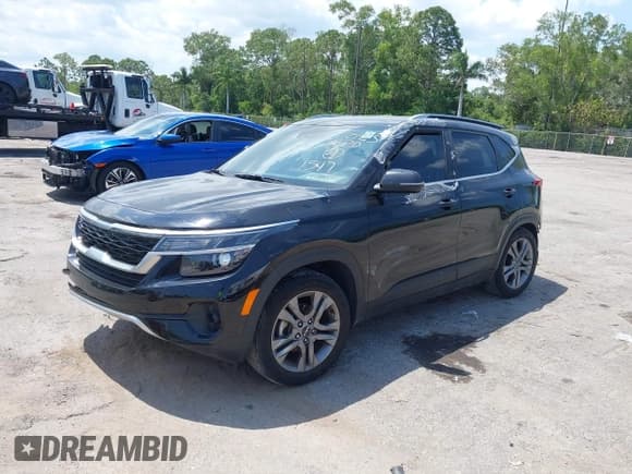 ✅ 2023 Kia Seltos S • VIN: KNDEU2AA4P7371547 • Lot: 42242913. Listed on IAAI with 35,374 mi. Free auction sales archive from the USA and detailed vehicle history report at DreamBid. Image 17.