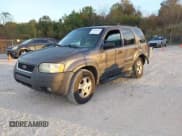 ✅ 2002 Ford Escape XLT Choice • VIN: 1FMYU03112KE00910 • Lot: 43698982. Listed on IAAI with 182,906 mi. Free auction sales archive from the USA and detailed vehicle history report at DreamBid. Image 2.
