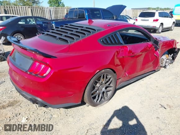 ✅ 2022 Ford Mustang GT • VIN: 1FA6P8CF8N5135411 • Lot: 43071297. Listed on IAAI with 10,720 mi. Free auction sales archive from the USA and detailed vehicle history report at DreamBid. Image 4.