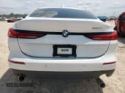 ✅ 2023 BMW 2 Series 228i • VIN: WBA53AK03P7M44939 • Lot: 69951555. Wystawiony na Copart z przebiegiem 55 939 mil. Bezpłatny archiwum sprzedaży aukcyjnych z USA i szczegółowy raport historii pojazdu na DreamBid. Zdjęcie 6.