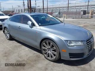 ✅ 2012 Audi A7 Premium Plus • VIN: WAUYGAFC1CN050271 • Лот: 43009715. Опубликован ранее на IAAI с пробегом 143 703 миль. Бесплатный доступ к архиву аукционных продаж из США и подробный отчёт об истории автомобиля на DreamBid. Изображение 1.