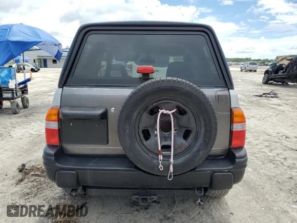 ✅ 2002 Suzuki Vitara JLS • VIN: 2S3TC52C526103788 • Лот: 80446185. Опубликован ранее на Copart с пробегом 85 742 миль. Бесплатный доступ к архиву аукционных продаж из США и подробный отчёт об истории автомобиля на DreamBid. Изображение 6.