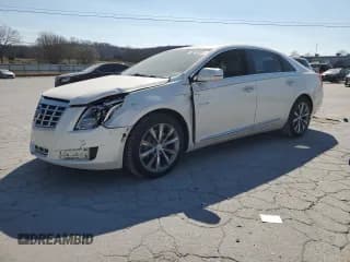✅ 2013 Cadillac XTS Livery • VIN: 2G61W5S38D9188210 • Lot: 48593535. Listed on Copart with 123,242 mi. Free auction sales archive from the USA and detailed vehicle history report at DreamBid. Image 1.
