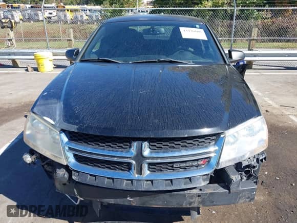 2013 Dodge Avenger SE with VIN 1C3CDZAB8DN677218, listed as a IAAI auction lot 43470109 with 140,223 mi miles and . Bid and sale history available at DreamBid. Image 13.