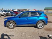 ✅ 2013 Mazda CX-5 Touring • VIN: JM3KE4CE8D0102801 • Lot: 43206563. Listed on IAAI with 149,282 mi. Free auction sales archive from the USA and detailed vehicle history report at DreamBid. Image 14.