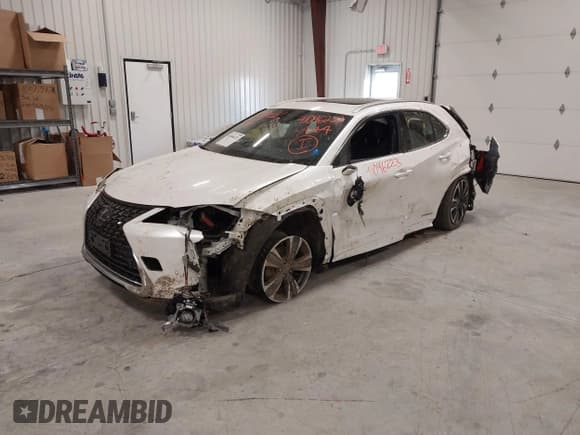 ✅ 2021 Lexus UX 250h • VIN: JTHP9JBHXM2041595 • Lot: 41046223. Listed on IAAI with 27,773 mi. Free auction sales archive from the USA and detailed vehicle history report at DreamBid. Image 2.