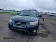 2010 Hyundai Santa Fe Limited with VIN 5NMSKDAG6AH359683, listed as a Copart auction lot 66179444 with 234,803 mi miles and Salvage title. Bid and sale history available at DreamBid. Image 12.