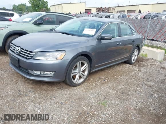 ✅ 2014 Volkswagen Passat SEL Premium • VIN: 1VWCT7A32EC118088 • Lot: 42847923. Listed on IAAI with 97,650 mi. Free auction sales archive from the USA and detailed vehicle history report at DreamBid. Image 2.