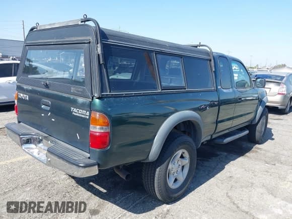 ✅ 2002 Toyota Tacoma PreRunner • VIN: 5TESN92N22Z095154 • Lot: 42516871. Listed on IAAI with 249,350 mi. Free auction sales archive from the USA and detailed vehicle history report at DreamBid. Image 4.