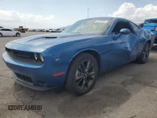 ✅ 2021 Dodge Challenger SXT • VIN: 2C3CDZGG1MH605305 • Lot: 64223385. Wystawiony na Copart z przebiegiem 14 038 mil. Bezpłatny archiwum sprzedaży aukcyjnych z USA i szczegółowy raport historii pojazdu na DreamBid. Zdjęcie 1.
