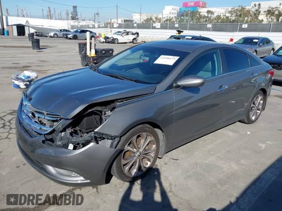 2013 Hyundai Sonata SE with VIN 5NPEC4AB7DH621765, listed as a IAAI auction lot 43450475 with 127,708 mi miles and . Bid and sale history available at DreamBid. Image 2.