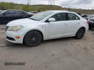 ✅ 2012 Suzuki Kizashi SE • VIN: JS2RE9A35C6101113 • Лот: 55964395. Опубликован ранее на Copart с пробегом 94 824 миль. Бесплатный доступ к архиву аукционных продаж из США и подробный отчёт об истории автомобиля на DreamBid. Изображение 1.