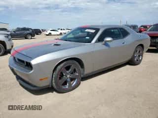 2014 Dodge Challenger SXT z VIN 2C3CDYAG0EH139872, wystawiony jako Copart lot #68122374 z przebiegiem 113 207 mil mil oraz Szkoda całkowita • Salvage title. Historia ofert i sprzedaży dostępna na DreamBid. Obrazek 1.