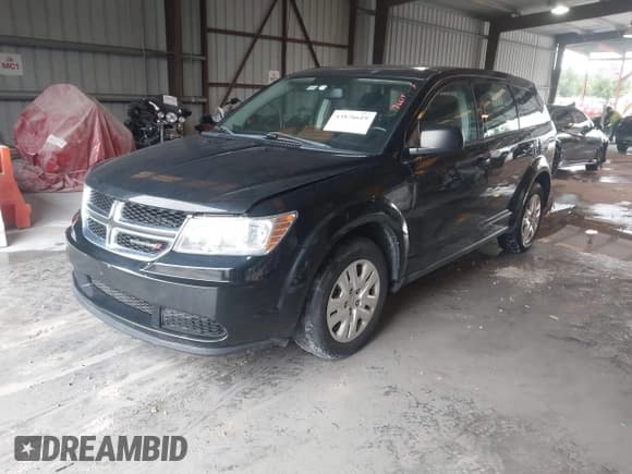 ✅ 2014 Dodge Journey SE • VIN: 3C4PDCAB7ET281275 • Lot: 43876619. Listed on IAAI with 129,908 mi. Free auction sales archive from the USA and detailed vehicle history report at DreamBid. Image 2.