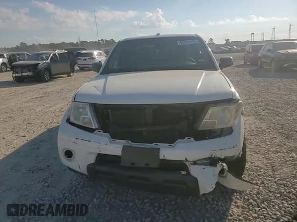 ✅ 2016 Nissan Frontier S • VIN: 1N6AD0ER8GN701718 • Lot: 82553145. Listed on Copart with 103,199 mi. Free auction sales archive from the USA and detailed vehicle history report at DreamBid. Image 13.