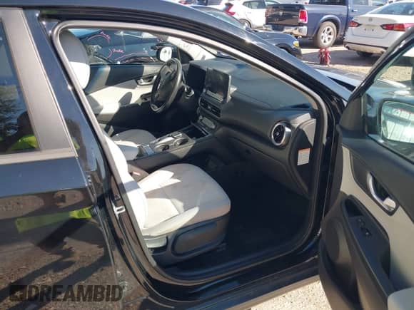 2023 Hyundai Kona SEL with VIN KM8K33AG1PU193495, listed as a IAAI auction lot 43545519 with 54,874 mi miles and . Bid and sale history available at DreamBid. Image 5.